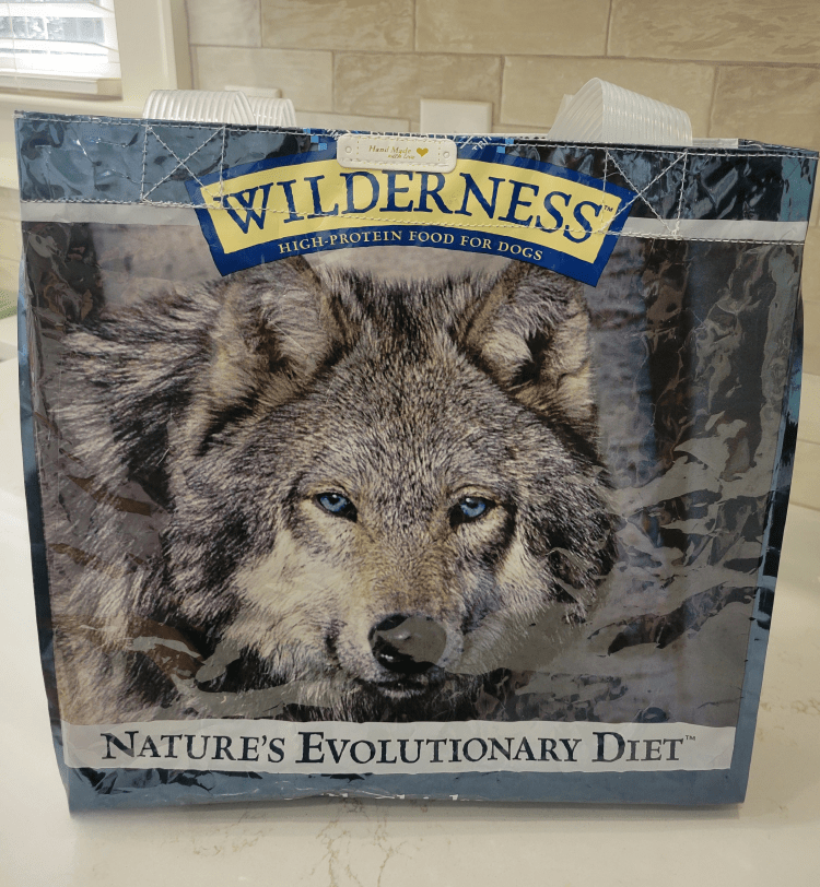 blue buffalo wilderness dog food bag with wolf pictured on front