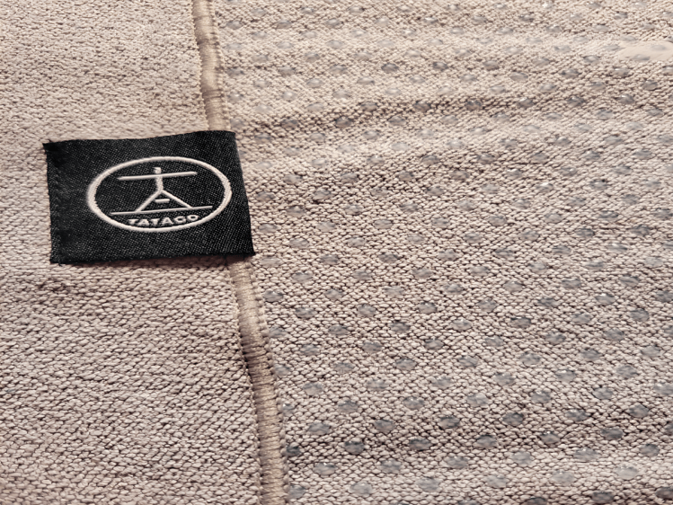 image of close-up view of Tatago, non-skid silicon towel for yoga mats